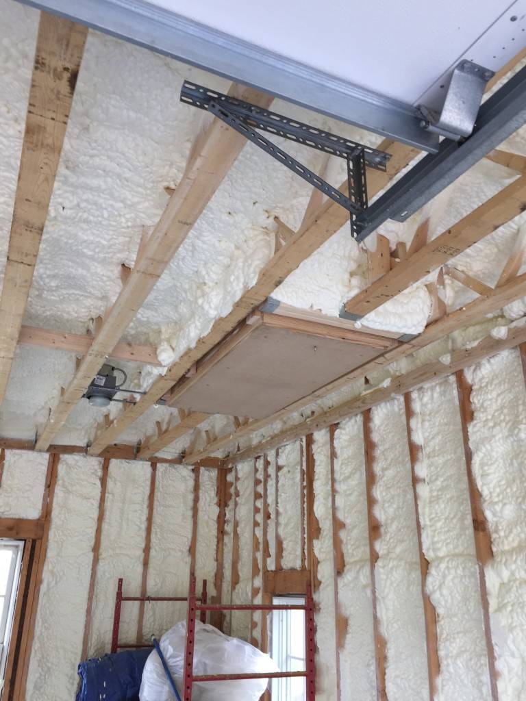 Spraying Around the Attic Hatchway